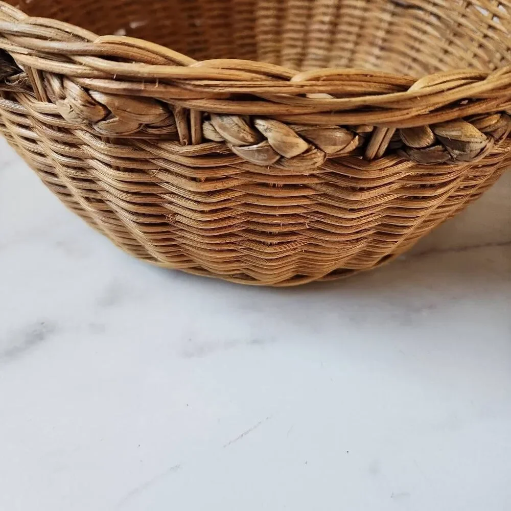 Woven wicker round basket handles various clear glass bottles vintage spice pine